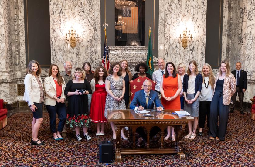 WDFW staff and others with Governor at signing of Senate Bill 5371