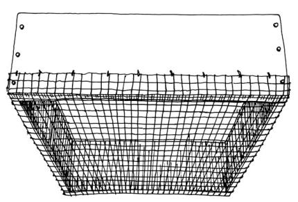  A drawing shows chicken wire covering the bottom of a garden planter.